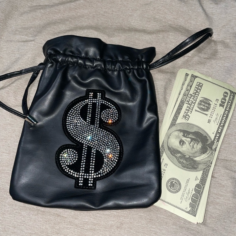 Money bag with fake money